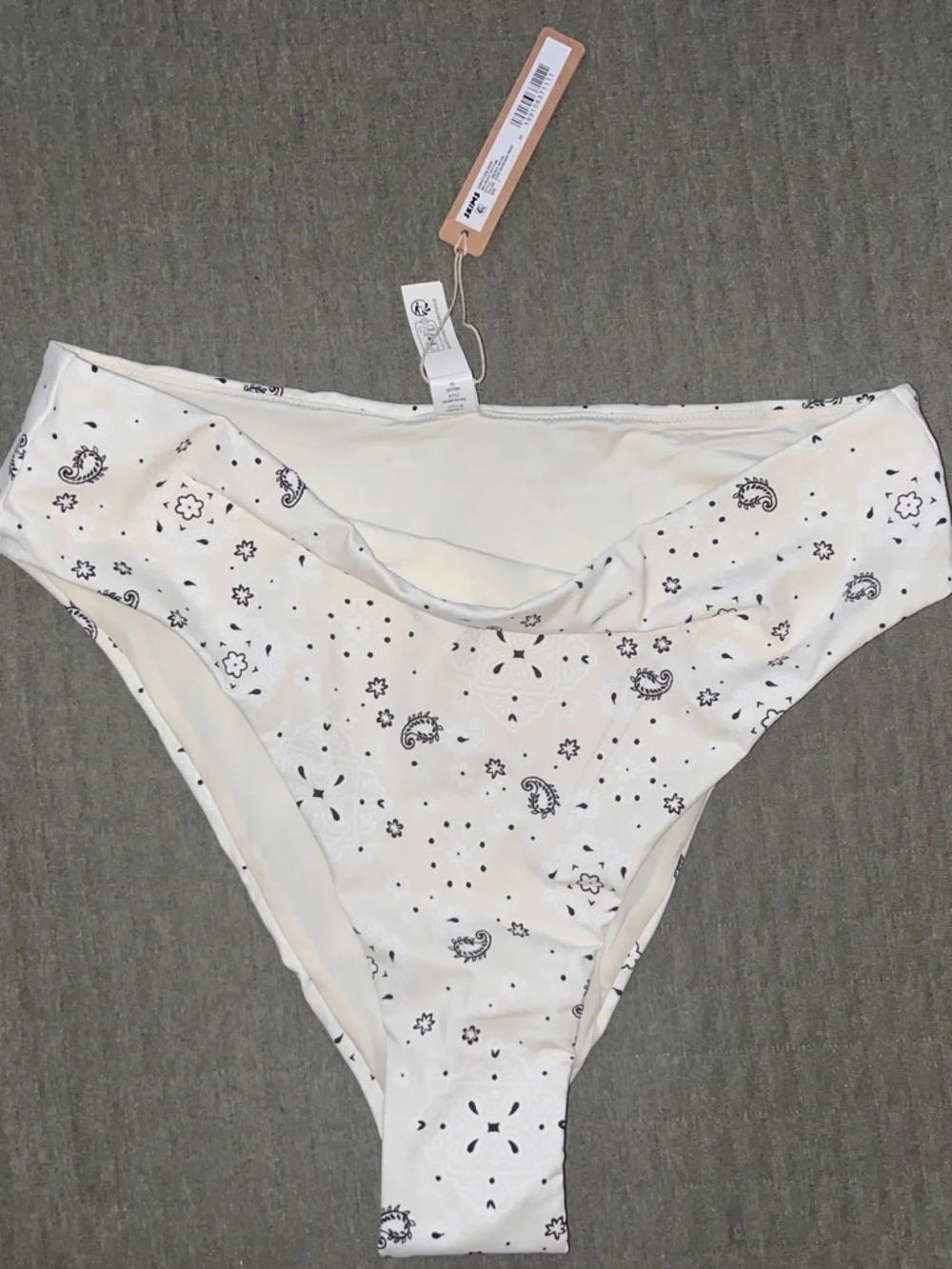 SKIMS Cream Bikini Bottoms with Black Paisley Print Accents